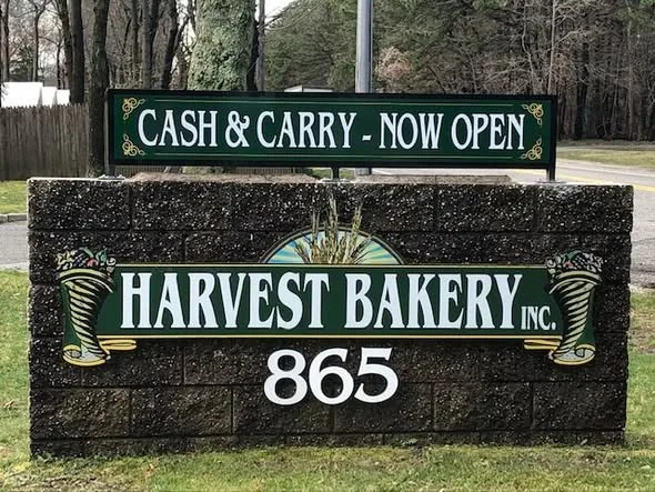 Harvest Bakery team meeting a customer
